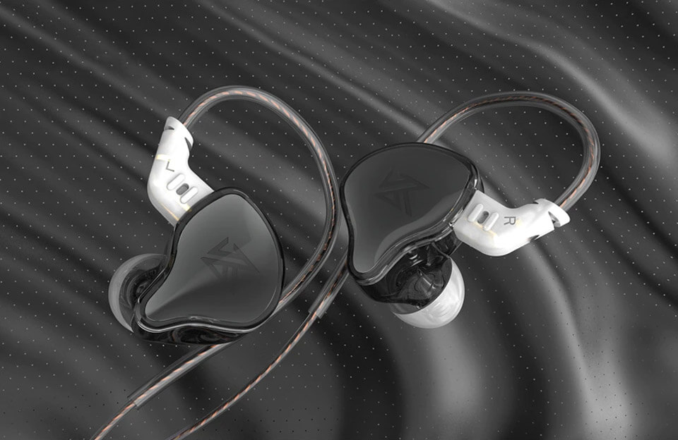 Black KZ EDC earphones on black background