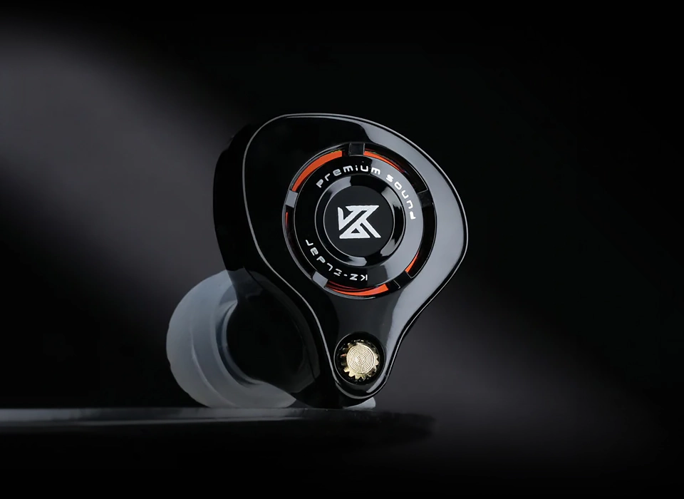 Black KZ Eldar earphones on vinyl record